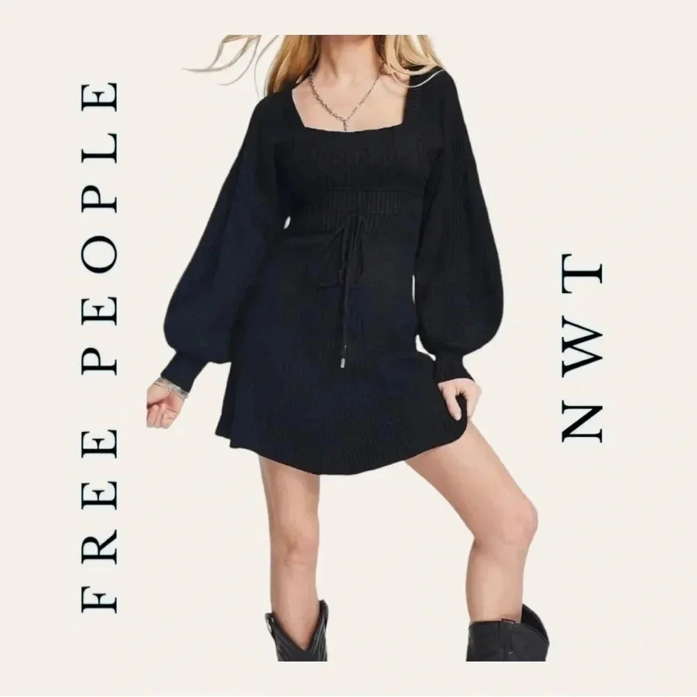2101. Free PEOPLE EMMALINE KNIT MINI DRESS SIZE LARGE BLACK IN COLOR NEW